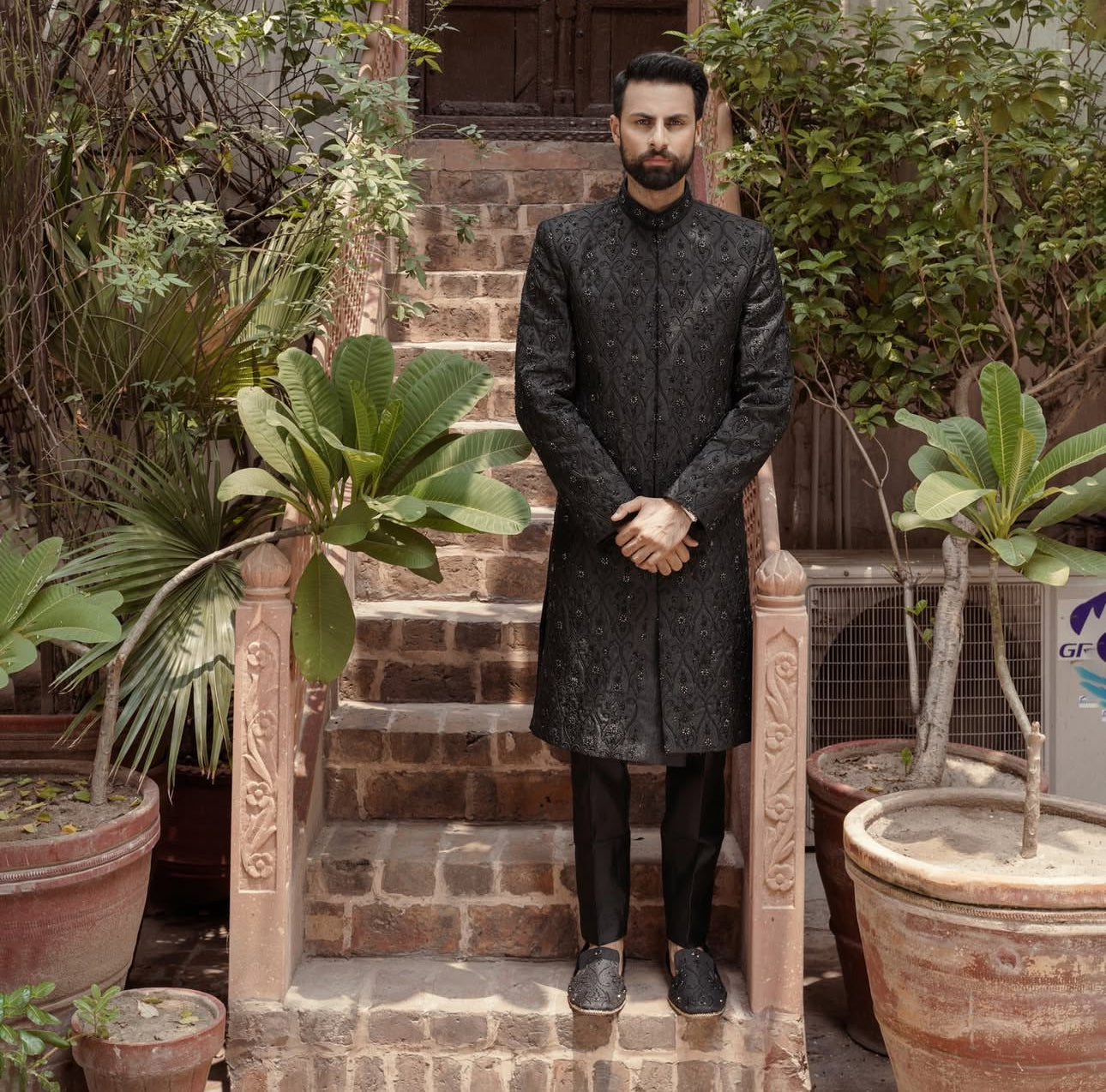 Aswad black sherwani front view – bespoke groom wedding sherwani UK