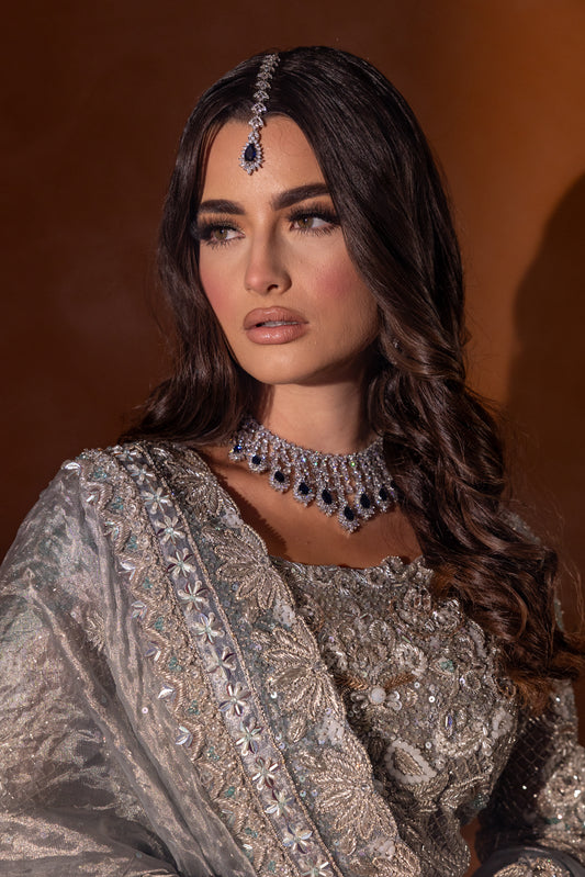 Close-up of bespoke embroidery and craftsmanship on Azure pure Indian tissue bridal outfit by Aya Nur